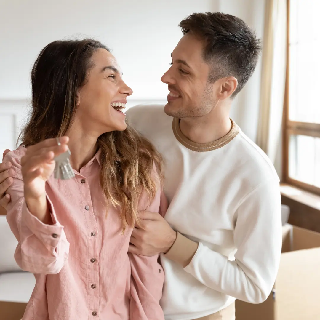 new homeowners holding their keys - LOKL New Mover Marketing
